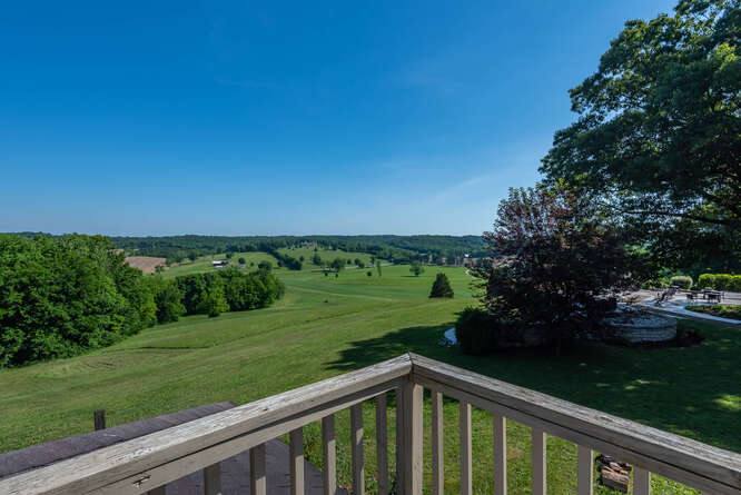 The view from the deck of the hilltop accommodation, looking out across the countryside