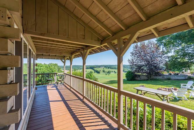 The cabin's wrap-around porch