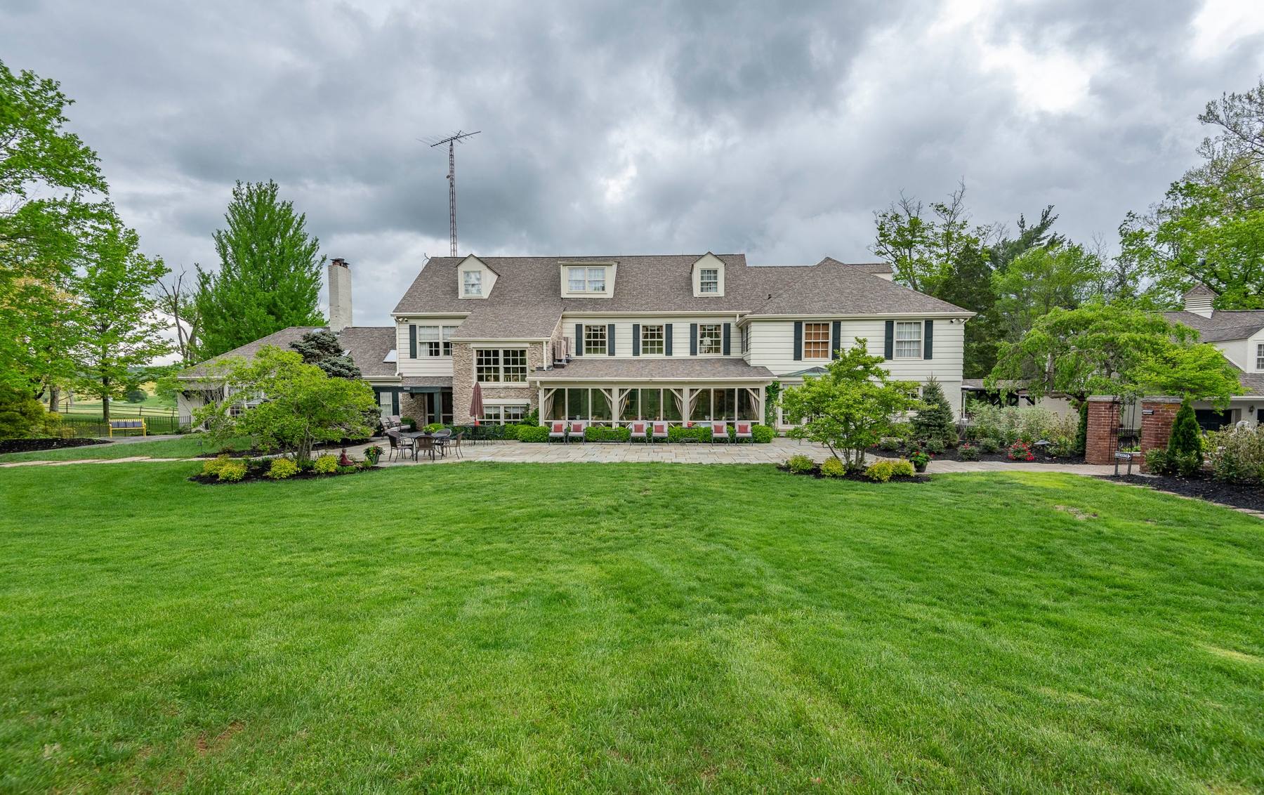 The Estate House and its manicured grounds
