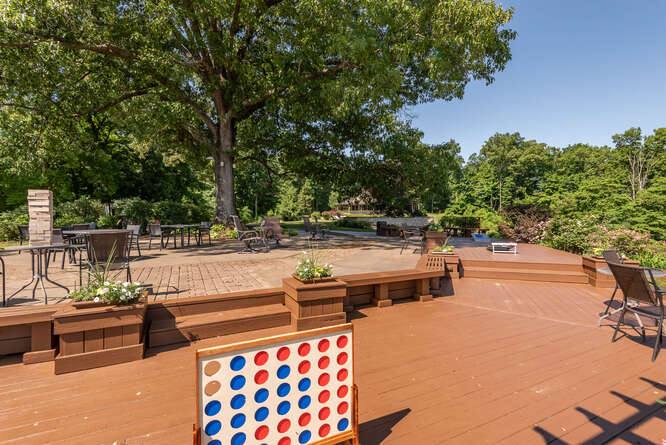 Decks and lawn games set out on the estate grounds